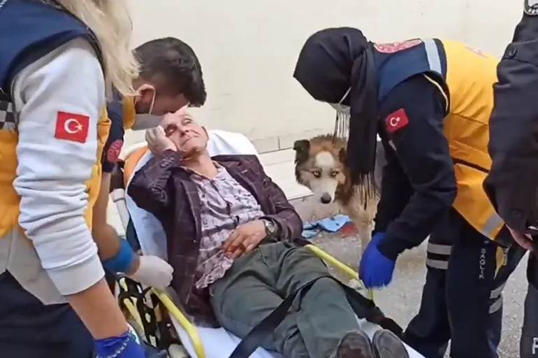 Bursa'da düşüp yaralanan adamın köpeği yanından ayrılmadı